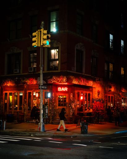 New Yorkers socialize at a bar outside due to coronavirus on St. Mark's street, the historical center of the East Village