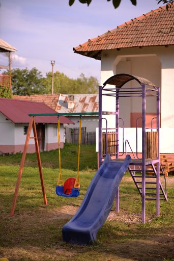 A playground for children on a yard of a primary school in a village