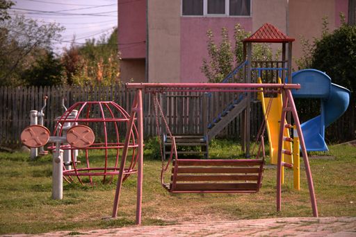 A playground for children on the yard of a primary school in a village