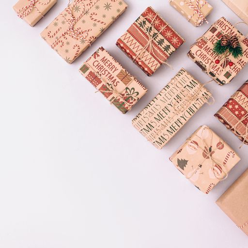 Creative Christmas background with gift boxes arranged on the right side. Festive composition with a copy space