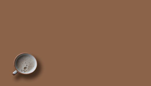 A top view of a cup of coffee on a brown background with copyspace