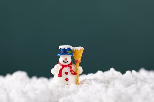 A closeup shot of Christmas decoration on green blurred background