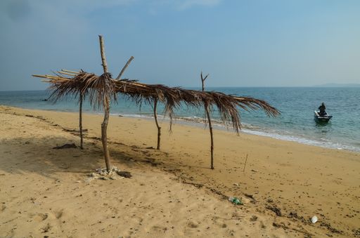 Shade made out f branches and palm leaves on the Gwa island beach inMyanmar