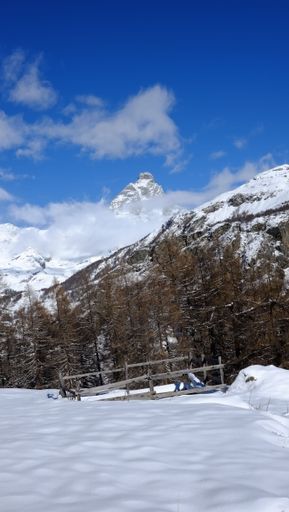 A vertical shot of The Matterhorn under the sunlight in the Alps