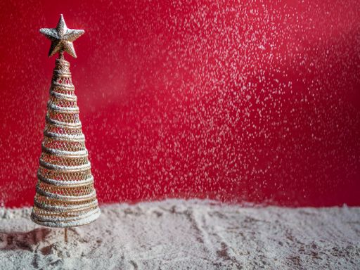 Red Christmas wallpaper of Christmas tree under snow