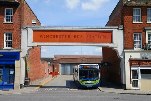 A bus exits from the bus station in Winchester, Hampshire, United Kingdom, on to the main road.