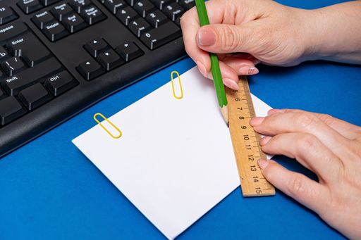 Multiple Assorted Collection Office Stationery Photo With Pens Notepads Notebook Ruler Stapler Scissors Clippers Paper Clips Holders Over Table