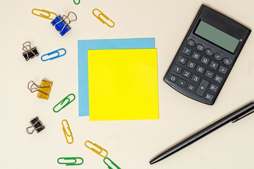 Multiple Assorted Collection Office Stationery Photo With Pens Notepads Notebook Ruler Stapler Scissors Clippers Paper Clips Holders Over Table