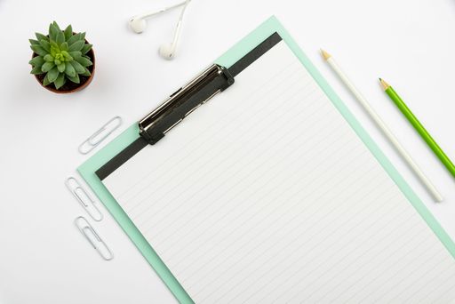Multiple Assorted Collection Office Stationery Photo With Pens Notepads Notebook Ruler Stapler Scissors Clippers Paper Clips Holders Over Table