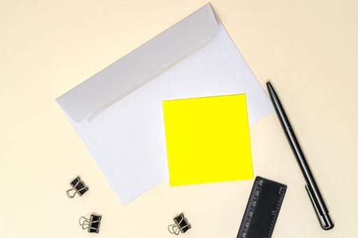 Multiple Assorted Collection Office Stationery Photo With Pens Notepads Notebook Ruler Stapler Scissors Clippers Paper Clips Holders Over Table