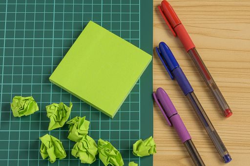 Multiple Assorted Collection Office Stationery Photo With Pens Notepads Notebook Ruler Stapler Scissors Clippers Paper Clips Holders Over Table