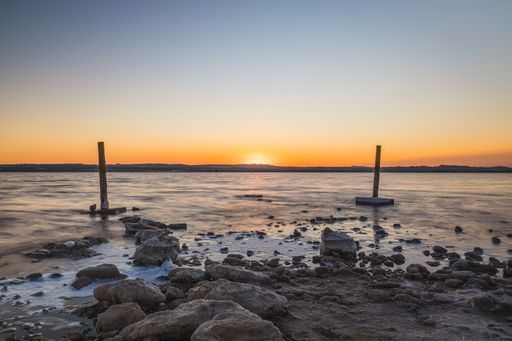 A landscape of the pink sea with long exposure in the evening in the Torrevieja Natural Park, Spain