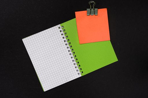 Multiple Assorted Collection Office Stationery Photo With Pens Notepads Notebook Ruler Stapler Scissors Clippers Paper Clips Holders Over Table
