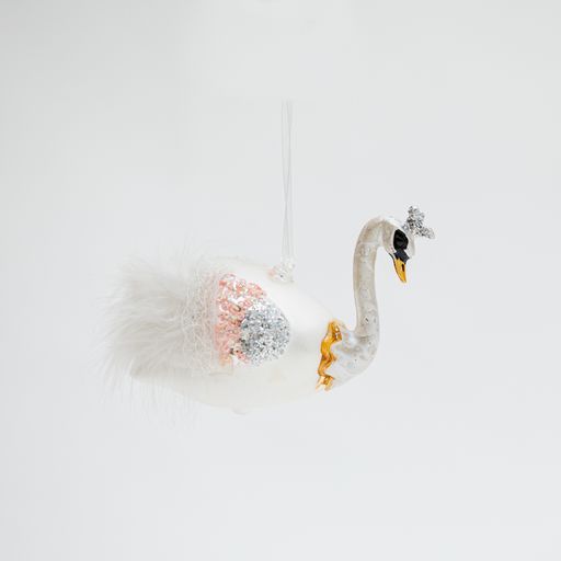 A vertical shot of a Christmas tree decoration swan isolated on a white background