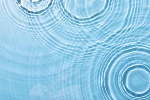 A closeup shot of blue water ripples - perfect for wallpaper