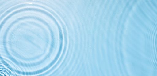 A closeup shot of blue water ripples - perfect for wallpaper