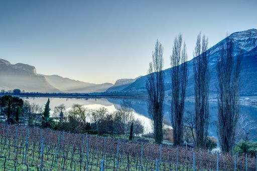 A beautiful view of Lake Kaldaro by the mountains in South Tyrol, Italy