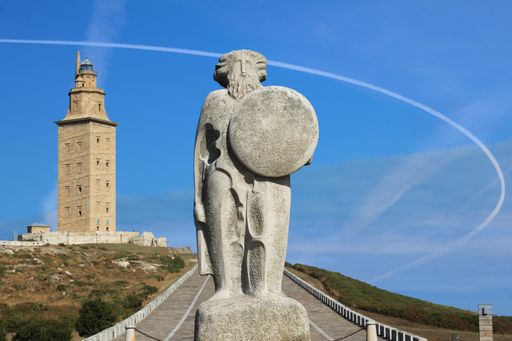 A shot of the Breogan statue and Hercules lighthouse in Spain