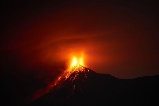 Violent eruption of Fuego Volcano at night observed in San Antonio Aguas Calientes near Antigua Guatemala