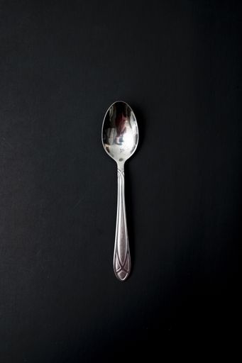 A top view of the spoon on a black background