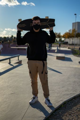 A vertical shot of a skater at a park