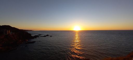 A scenic view of beautiful sunset over the Devon coast