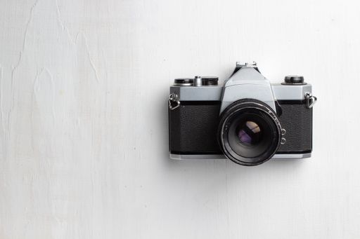 A top view of a professional camera on the table