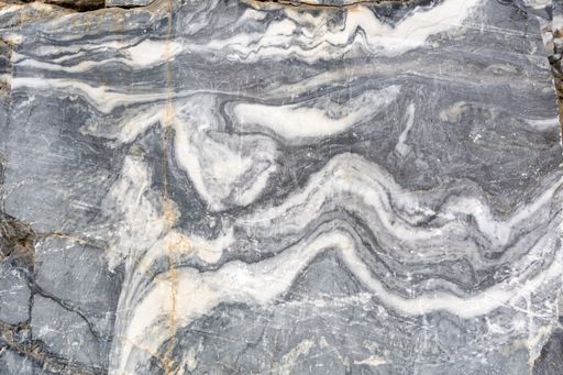 A closeup of a gray and white marble surface - perfect for wallpapers and backgrounds