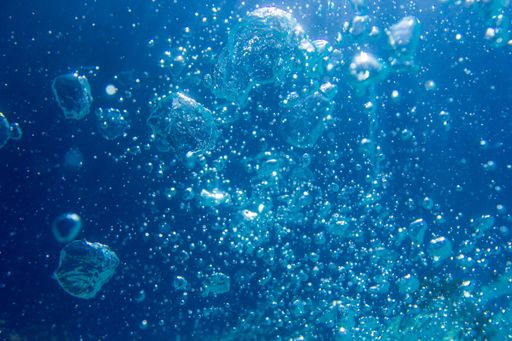 A closeup of bubbles under the water