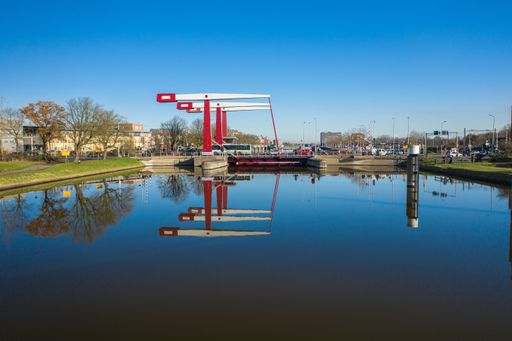 A bridge over the water with buildings in the distance in Middelburg, Netherlands.