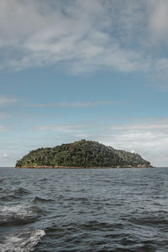 A mesmerizing shot of Ilha Feia island surrounded by ocean