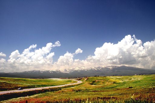 A beautiful shot of clouds over mountains