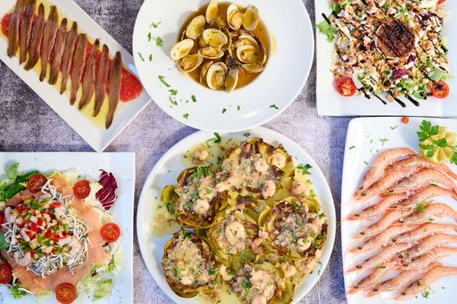 An organized arrangement of assorted dishes on a flat surface