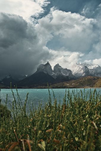 A picturesque view of Mirador Cuernos, National Park of Torres del Paine with a majestic mountain in the background