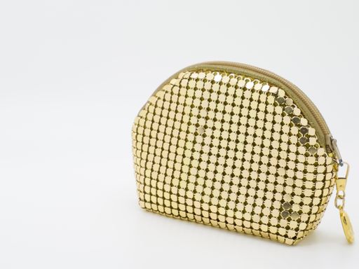A closeup shot of gold pouch isolated on white background