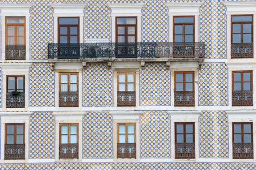 Detail of the tile finish on the facade of the old building in the city of Lisbon