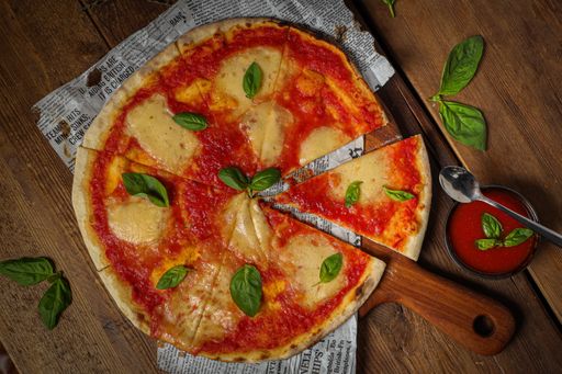 A top view shot of a delicious-looking pizza