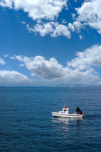 A group of people on the boat sailing in
