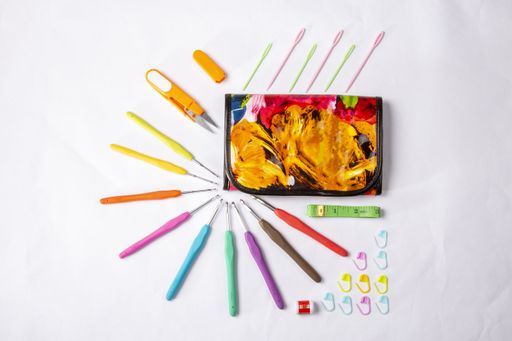 A top view of a generic crochet set on a white background