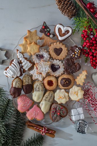 An assortment of Christmas cookies arranged on a tabletop