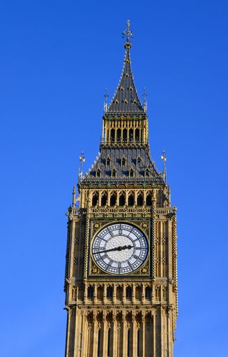 Top of the iconic clock tower housing Big Ben, at the Houses of Parliament, London, England, Great Britain, United Kingdom, on a sunny day
