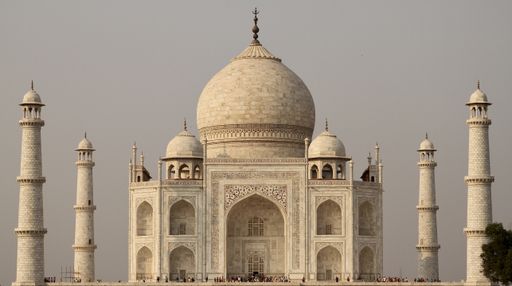A beautiful view of Taj Mahal during the day with gloomy background