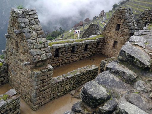 The Machu Picchu frames with a view of Huayna Picchu Sacred Valley in Peru