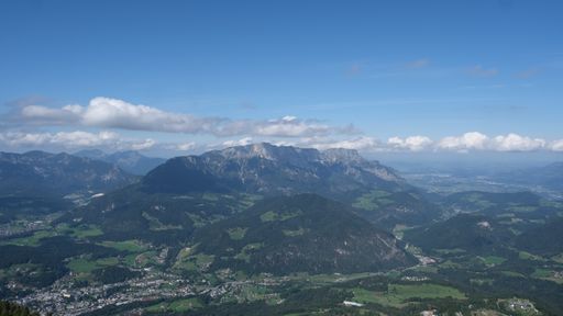An aerial shot of the beautiful Bavarian Alps surrounded by clouds captured in Germany