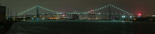 The Ambassador Bridge spans the Detroit River to join Detroit, MI and Windsor, ON