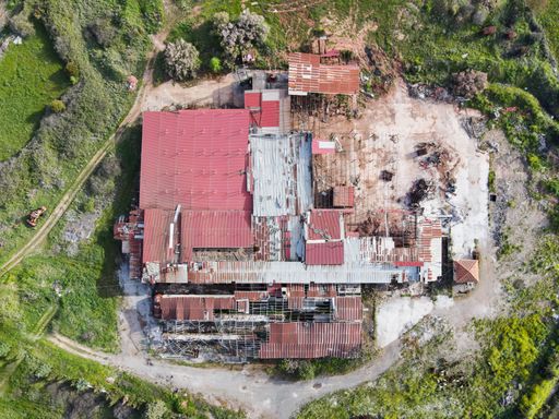 An aerial top view of an old brick factory in Polichnitos,Lesvos,Greece