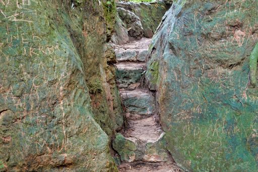 A beautiful shot od a small road between two huge rocks