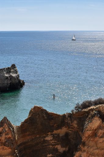 A vertical scenic view of Praia da Prainha - Prainha Beach, Alvor, Portimao, The Algarve, Portugal