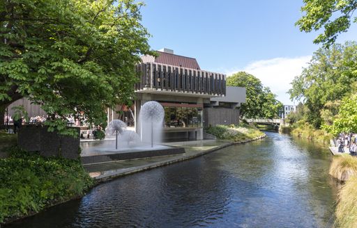 Christchurch, New Zealand, December 19 2020. The town hall alongside the river and the Ferrier fountain provides the backdrop.