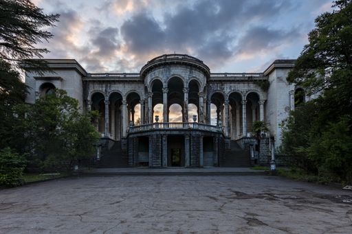 The historical Derelict Sanatorium Medea in Tskaltubo, Georgia during the sunset